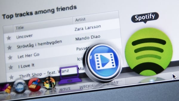 Spotify's total monthly active users rose 18% to a record 406 million, but forecast current quarter paid subscribers of 183 million, below expectations of 184 million