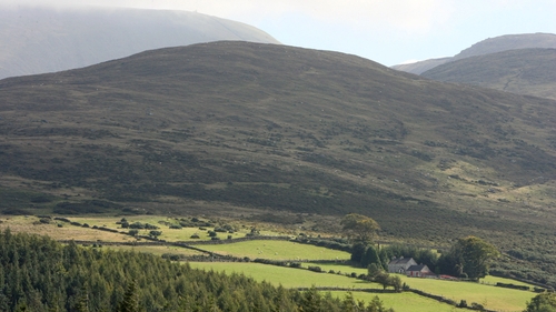 One man was walking on Wee Binnian while a second man was walking on Slieve Commedagh