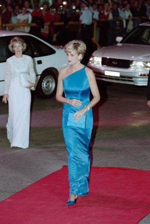 Beautiful in blue. Diana arrives at the Victor Chang Cardiac Research Institute dinner dance in Sydney in 1996.
