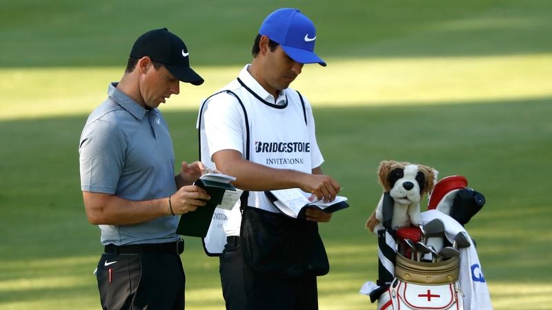 McIlroy works though his yardages with best friend Harry Diamond