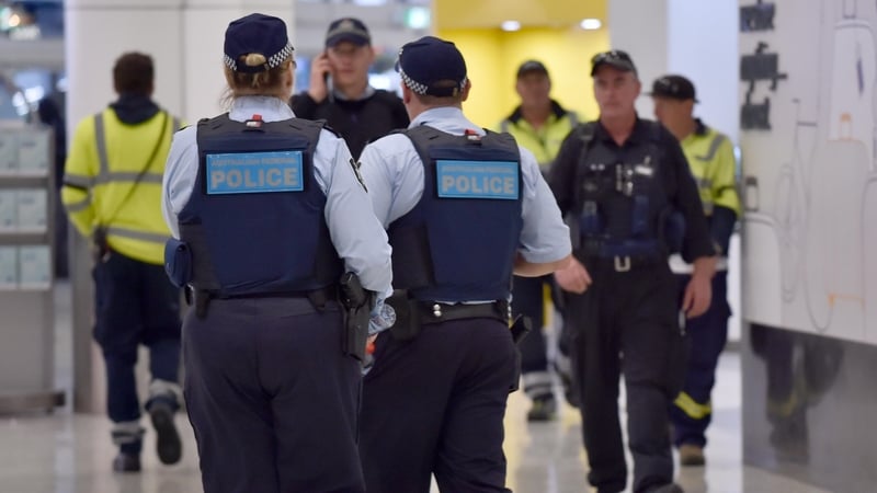 Police on patrol in Sydney International Airport