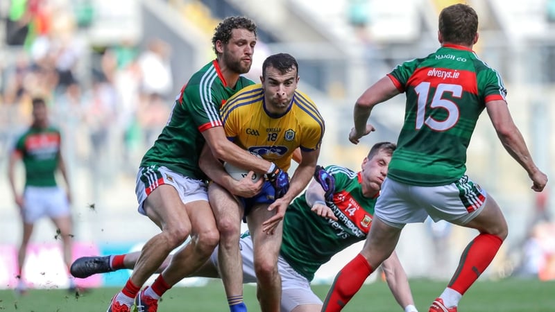 Mayo's Tom Parsons tackles Roscommon's Caoileann Fitzmaurice
