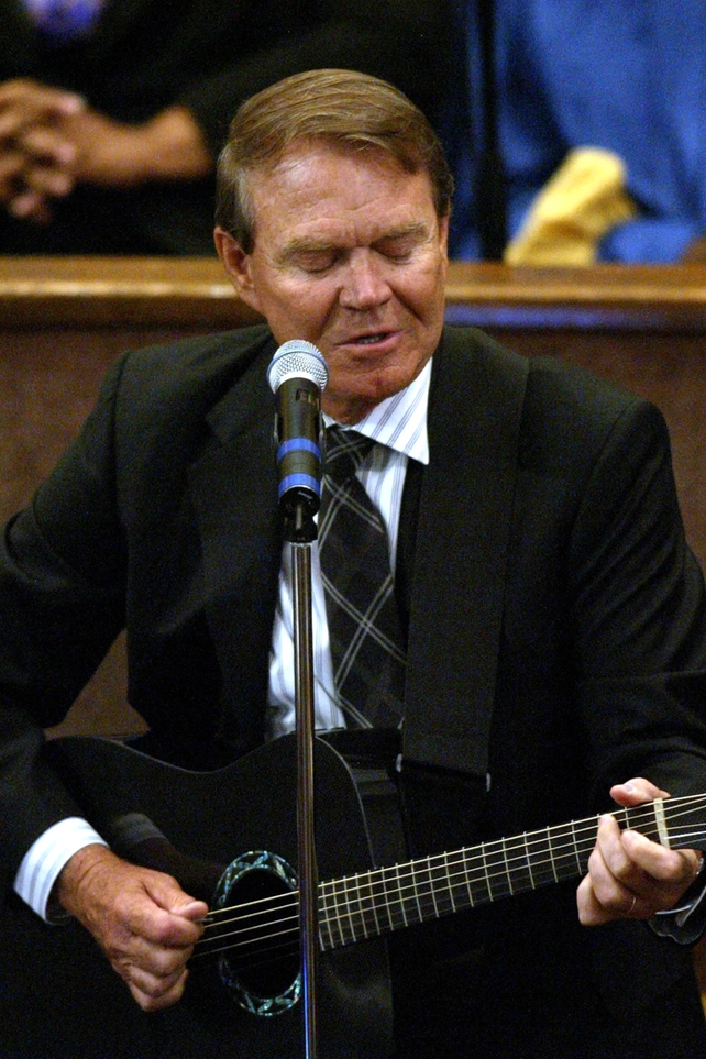 Glen Campbell playing at the Ray Charles Funeral service, 2004 in Los Angeles.