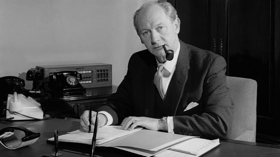 Fianna Fáil Taoiseach Jack Lynch working at his desk in his office, most likely in 1969.