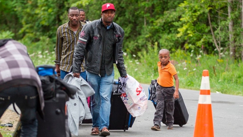 Asylum seekers arrive at the US border with Canada