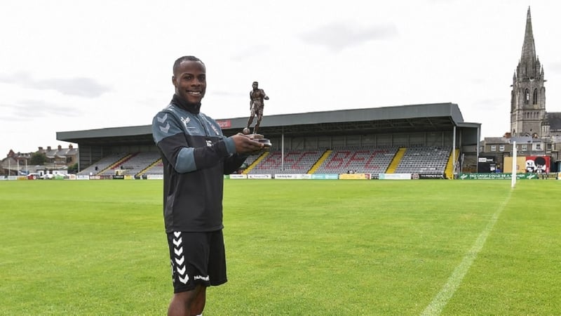 Fuad Sule with his award in Dalymount Park