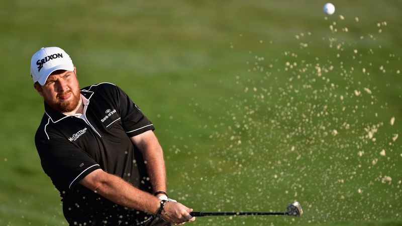 Lowry plays a shot on the tenth hole during his first round at Quail Hollow