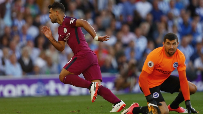 Sergio Aguero wheels away in celebration