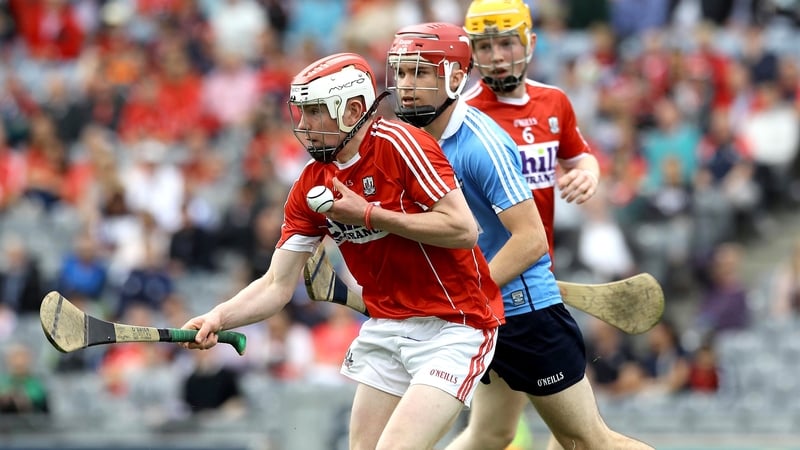 Dublin's Conor O'Callaghan pursues Eoghan O'Neill of Cork.