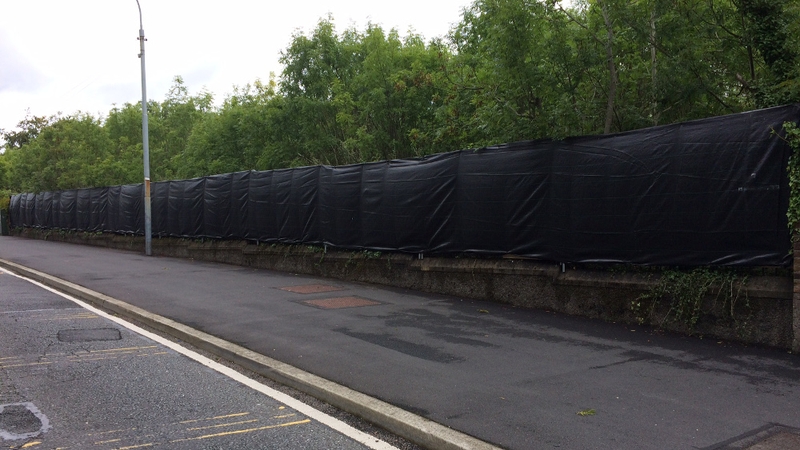 An area around the dig site has been screened off