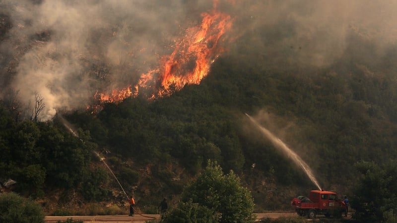Fire crews work to tackle the flames