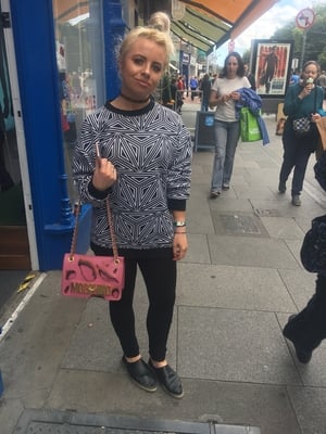 Sarah O' Shea wears a crew neck jumper from Topshop with black trousers from Urban Outfitters. She bought her shoes from & Other Stories and her bag is by Moschino.