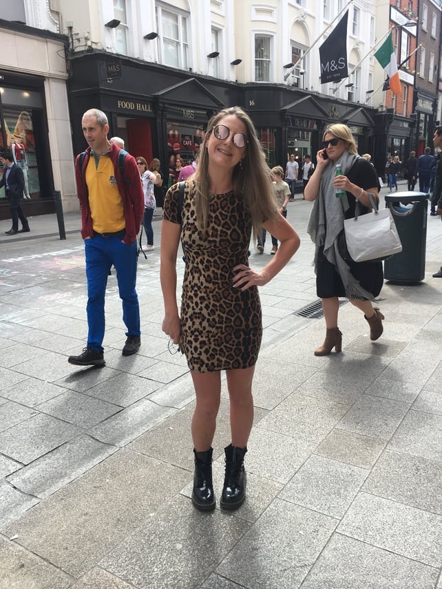 Michelle Whelan wears a leopard print dress from Asos.com, Dr. Martens boots and sunglasses from Sunday Somewhere