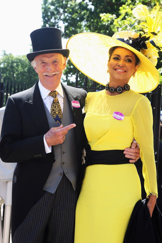 Bruce Forsyth and his wife Wilnelia Merced Forsyth arrive to attend Ladies' Day at Royal Ascot racecourse on June 19, 2008