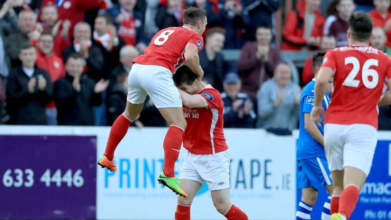 St. Patrick's Athletic's Graham Kelly celebrates scoring the first goal of the game with Michael Barker