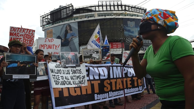 Relatives protest against extra judicial killings in the Philippines