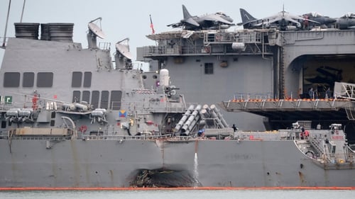 Warship sustained damage in collision with a tanker off Singapore
