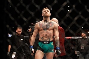 Conor enters the Octagon for his featherweight title fight against Jose Aldo in the MGM Grand Garden Arena.