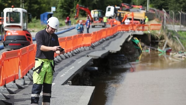 An engineer surveys damage