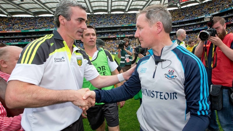 Jim Gavin (r) congratulates Jim McGuinness after his Dublin lose to Donegal in the 2014 semi-final