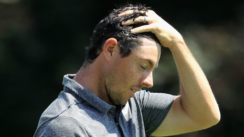 McIlroy reacts to the end of his first round at the Glen Oaks Club