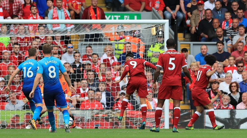 Liverpool's Roberto Firmino scores