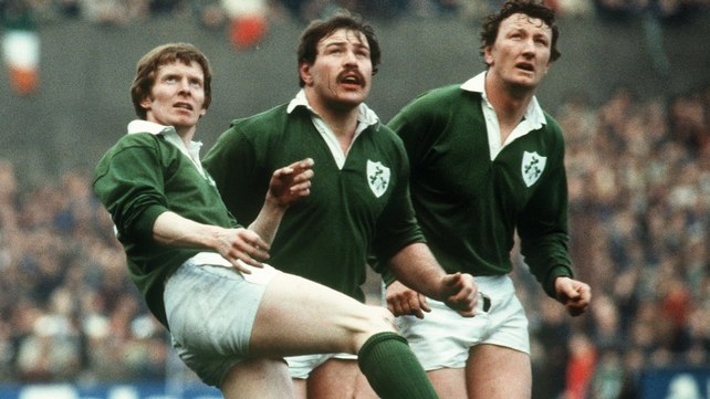 Duggan (R) and Phil Orr follow the flight of Ollie Campbell's (L) kick