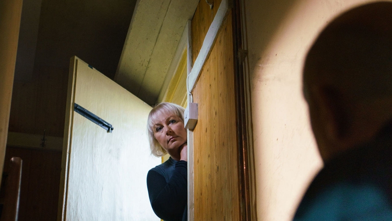 Eileen flings a tin of peas at an intruder in her house