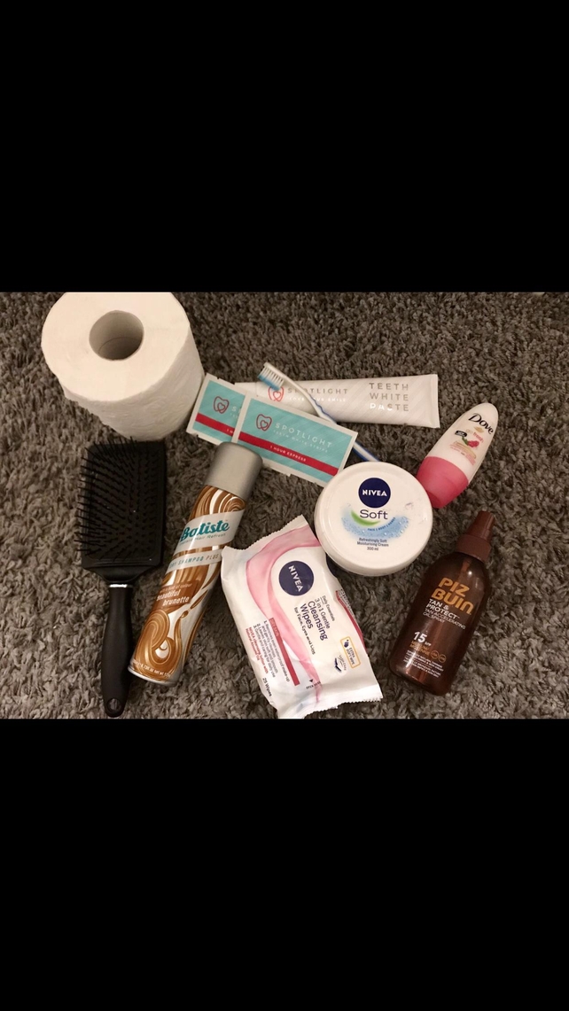 Toiletries including deodorant, make up wipes, dry shampoo, a hair brush, moisturizer, toilet paper, toothbrush, toothpaste and sun cream (you never know). If you want to be extra: Tooth whitening strips.