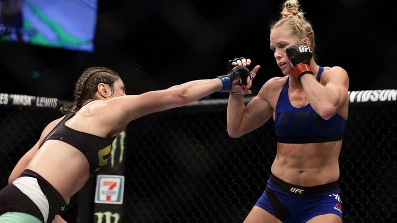 Holly Holm (r) in MMA action
