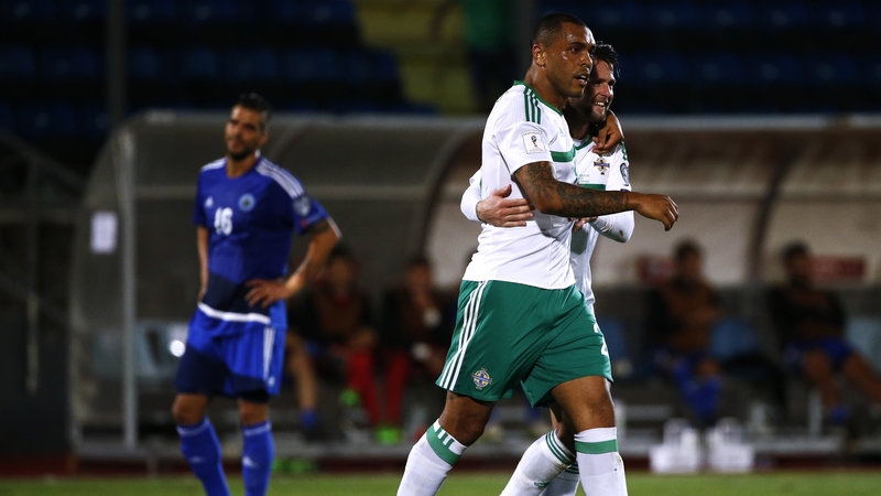 Josh Magennis and Oliver Norwood celebrate after the former scored Northern Ireland's second goal
