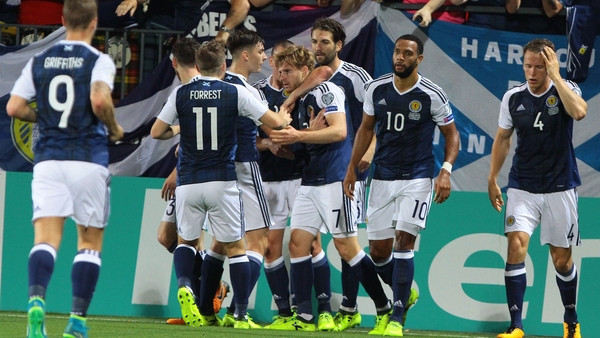 Scots keep hopes alive with easy win over Lithuania