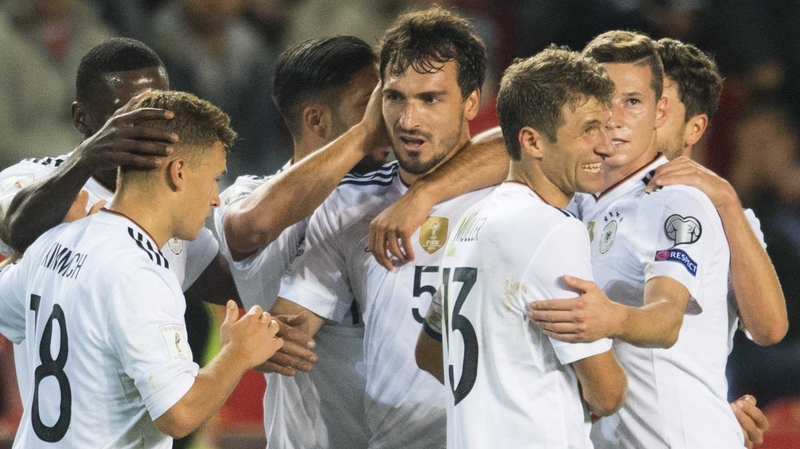 Mats Hummels is congratulated by his team-mates