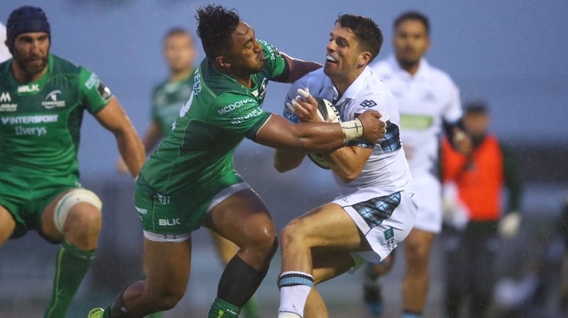 Connacht's Bundee Aki tackles Adam Hastings of Glasgow