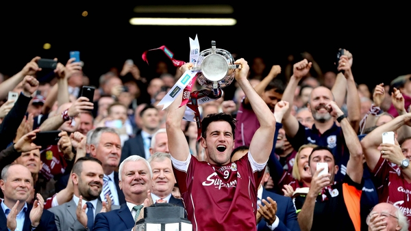 Galway captain David Burke hoists the silverware in the Hogan Stand in 2017