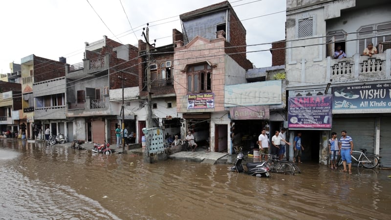 The floods have left over 1,400 dead and 13,000 people with respiratory infections