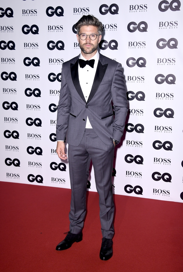 Darren Kennedy wore a Hugo Boss grey tuxedo with black lapels and a velvet bow tie and black shoes with suede.