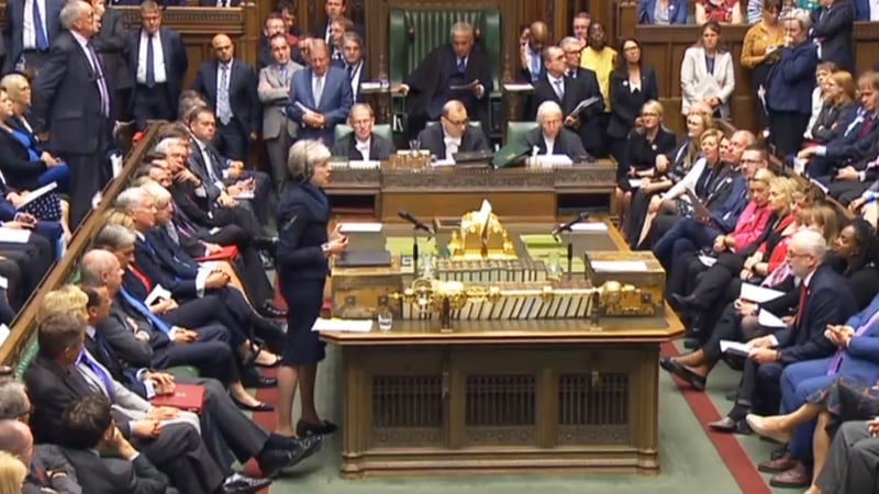 Theresa May told the Commons that the focus should be on resolving the current differences in Northern Ireland