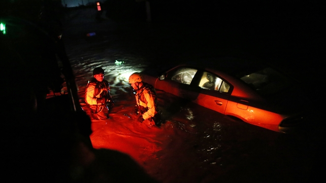 A rescue team from the local emergency management agency inspects flooded areas after the passing of Hurricane Irma in Fajardo, Puerto Rico