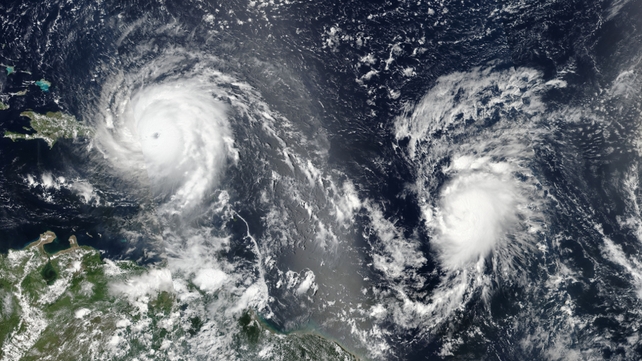 A NASA photo shows Hurricane Irma (L) and Hurricane Jose (R) in the Atlantic Ocean. Jose strengthened into a category 1 hurricane, as Irma (category 5) continues to move through the Caribbean