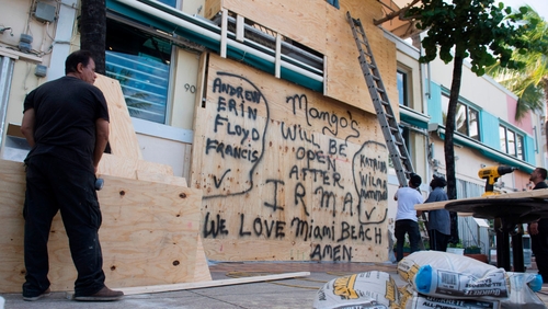 Business owners in Miami board up their premises ahead of Hurricane Irma