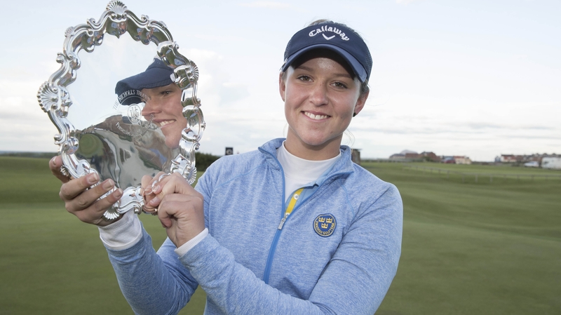 Linn Grant poses with her trophy