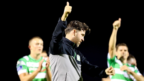 Stephen Bradley salutes the fans after the Hoops' win against Bluebell United