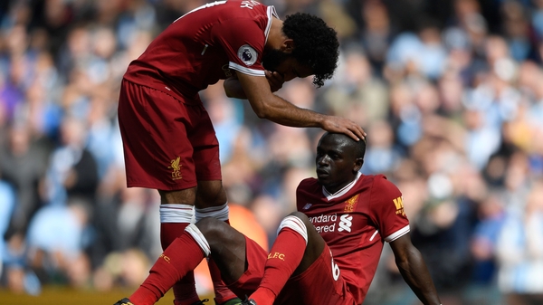 Mo Salah consoles Sadio Mane after his sending off