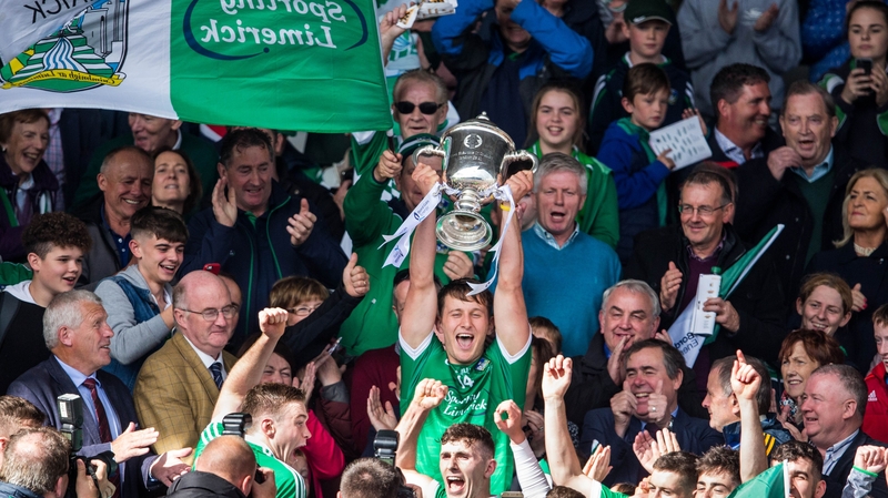 Limerick captain Tom Morrissey lifts the trophy