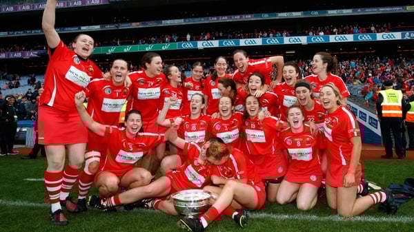 The Cork team celebrate with the O'Duffy Cup