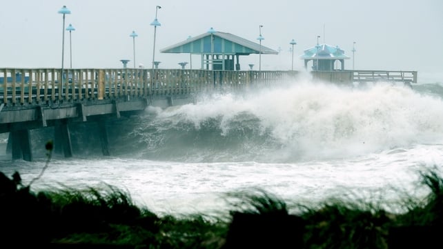 Large waves produced by Hurricane Irma crash into the end of Anglins Fishing Pier in Fort Lauderdale, Florida