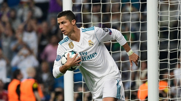 Ronald grabs the ball from the net after scoring