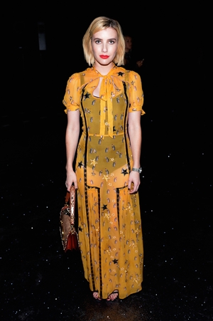 Actress Emma Roberts looks striking at the Coach Spring fashion show.
