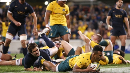 Will Genia claims one of Australia's six tries in Canberra